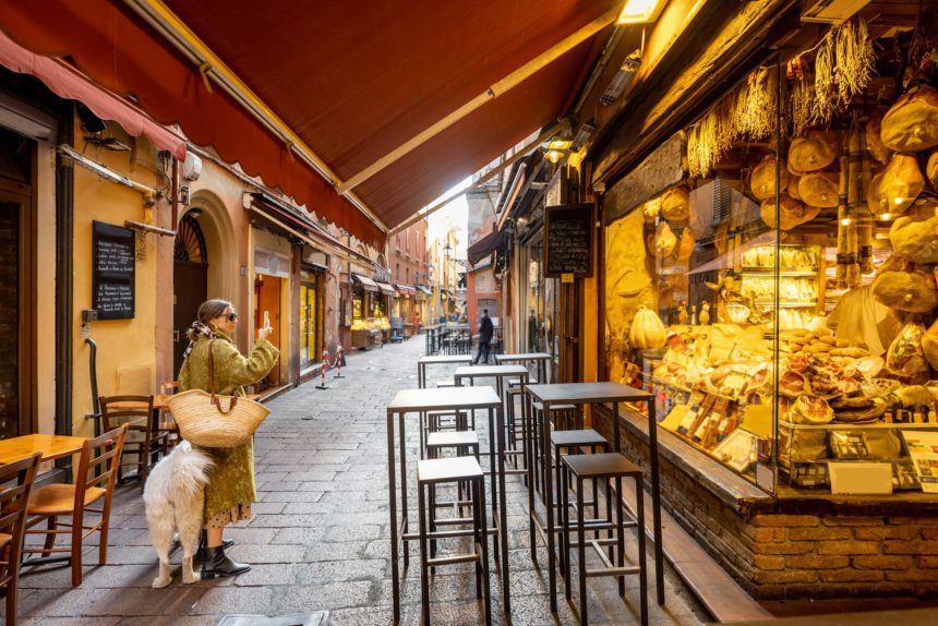 Famous gastronomical street with food stores in Bologna, Italy