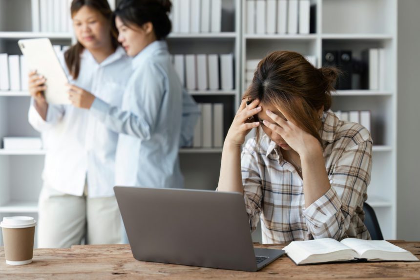 Stress, education and study with woman in library for exhausted, mental health and anxiety in